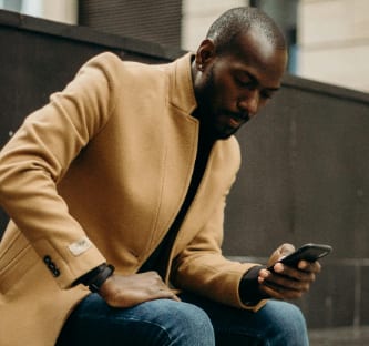 A man checks his phone